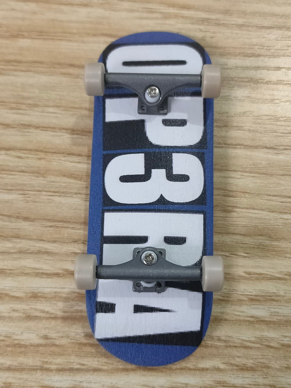 Op3ra Pro Fingerboard Solid Trucks 34mm-Raw Metal-Crown